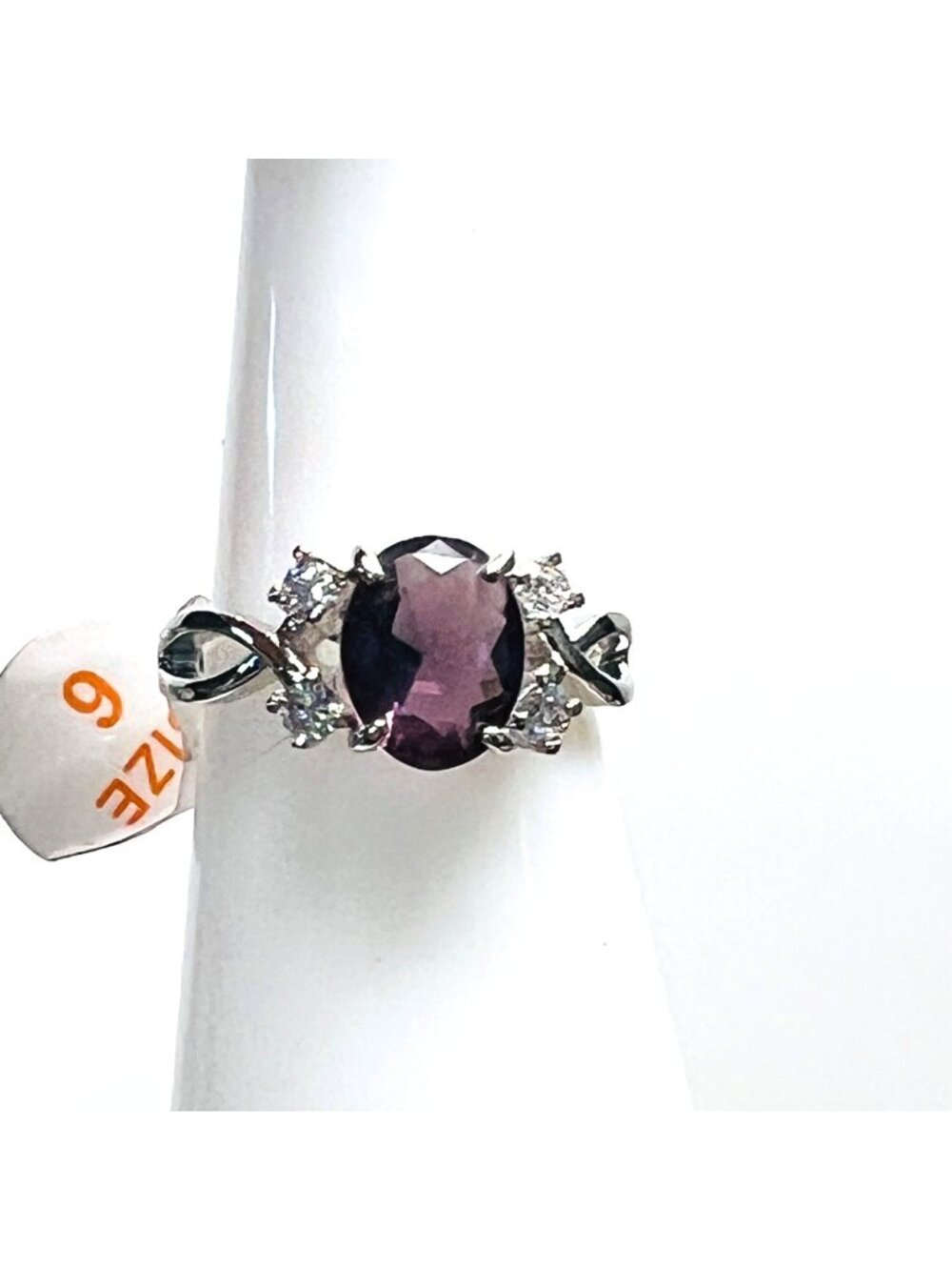 Ring Bomb Party Ring, size 6, purple main stone, CZ style accents, silver color